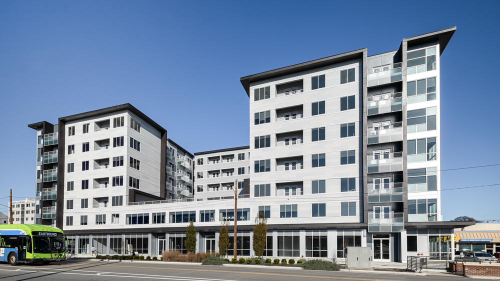 The Summit apartment building with Nichiha Illumination fiber cement cladding in white.