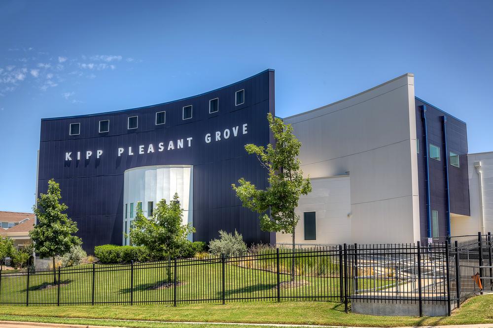 A shot of Kipp Pleasant Grove Middle School utilizing Nichiha’s Illumination fiber cement cladding in blue and off-white.