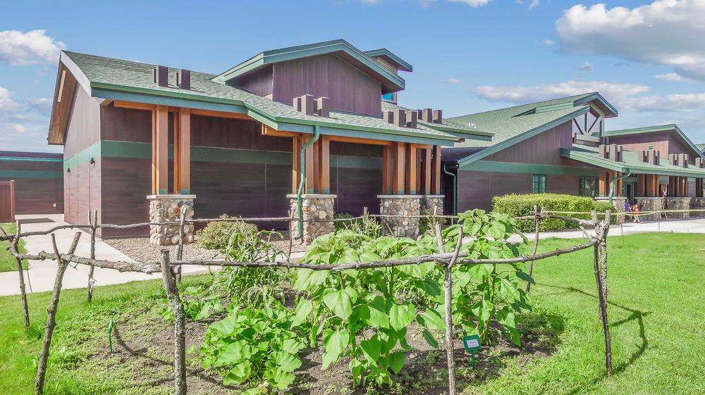 The Lewis & Clark Interpretive Center utilizing Nichiha&rsquo;s Illumination and RoughSawn fiber cement cladding in dark brown and green.