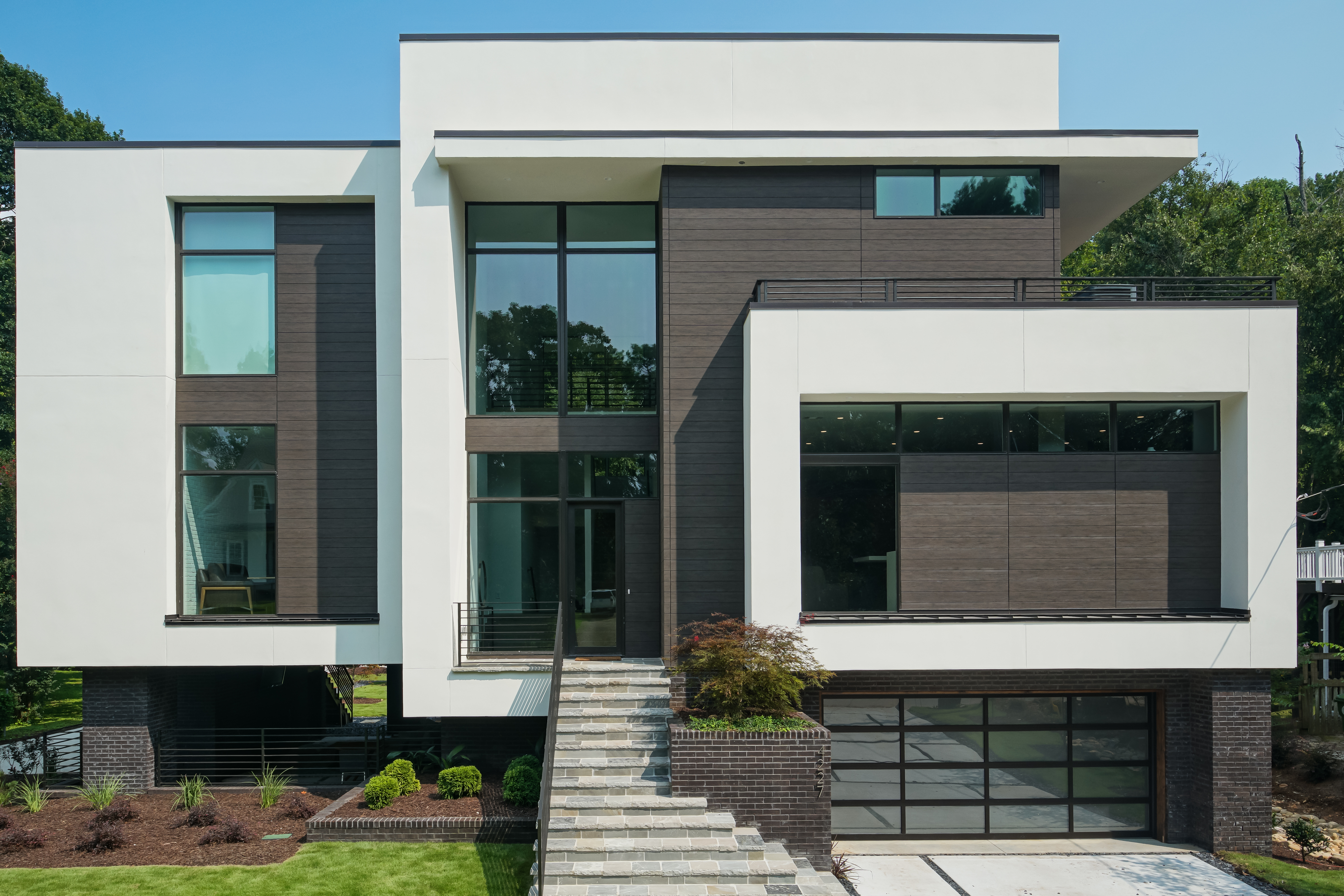 Exterior view of a building featuring Nichiha fiber cement panels and modern design