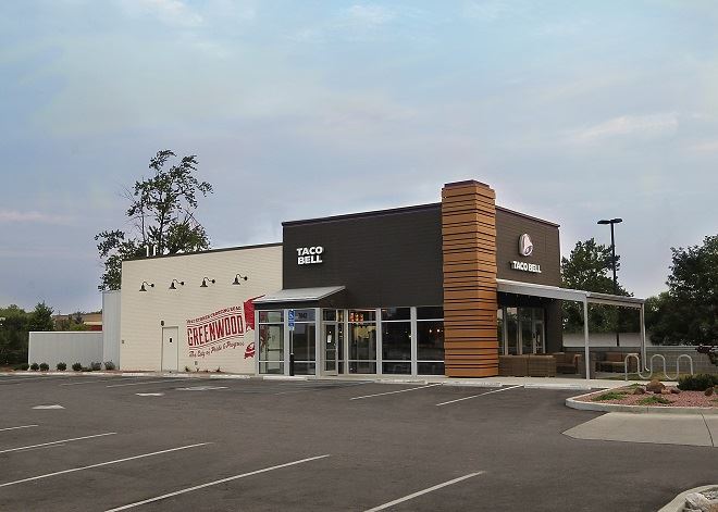 Exterior of fast food restaurant with fiber cement panels and signage
