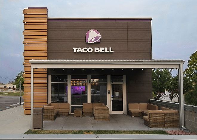 Exterior of fast food restaurant with fiber cement panels and signage