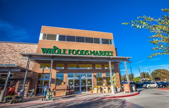 Exterior view of a building featuring Nichiha fiber cement panels and modern design