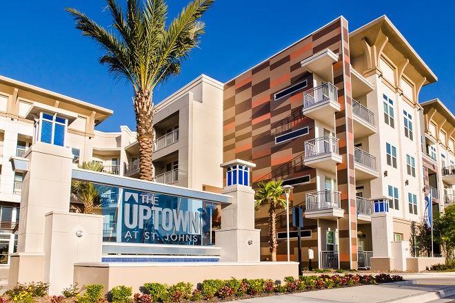 Exterior of Uptown St. Johns building in Jacksonville with fiber cement panels and modern design