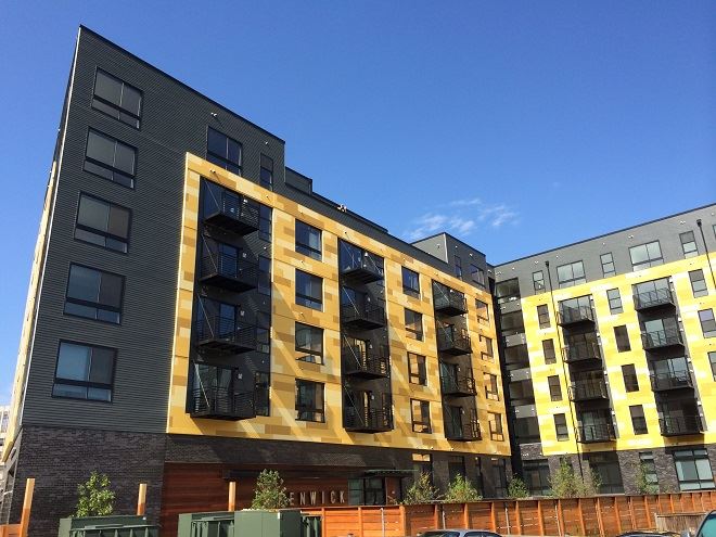Exterior view of Fenwick building with modern fiber cement panels