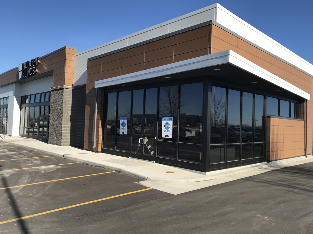 Budget Blinds storefront utilizing Nichiha&rsquo;s RiftSawn in pecan.