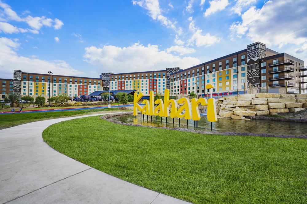 The Kalahari resort sign in yellow in front of their exterior designed by Nichiha&rsquo;s fiber cement cladding.