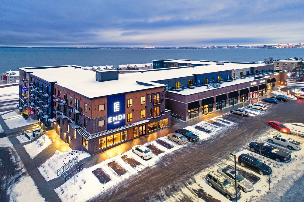 An aerial view of Endi apartment complex during a snowstorm.