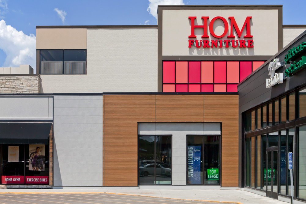 HOM Furniture utilizing different textures of Nichiha&rsquo;s fiber cement cladding.