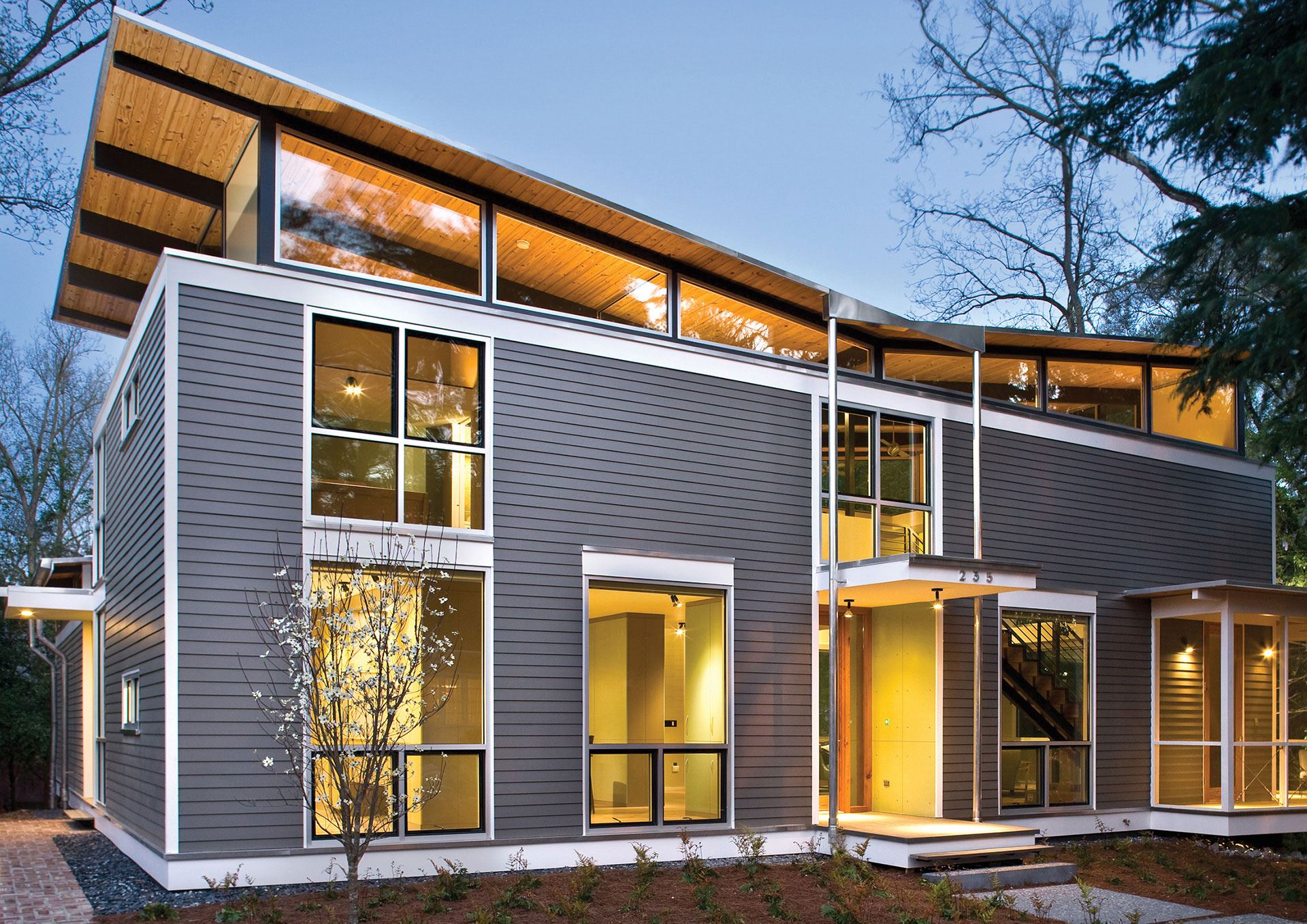 Exterior view of a building featuring Nichiha fiber cement panels and modern design