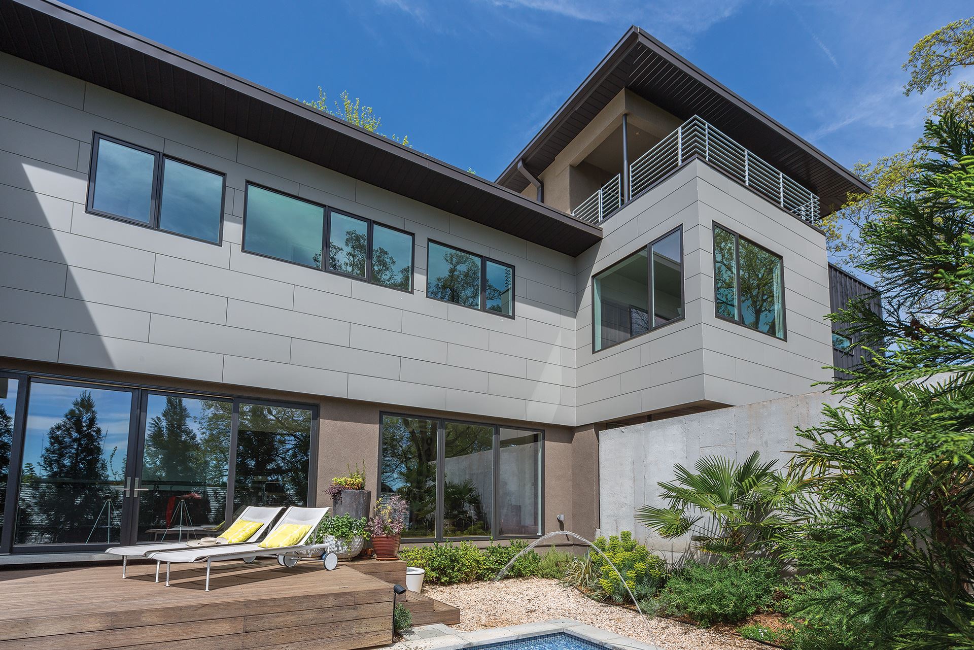 Exterior view of a building featuring Nichiha fiber cement panels and modern design