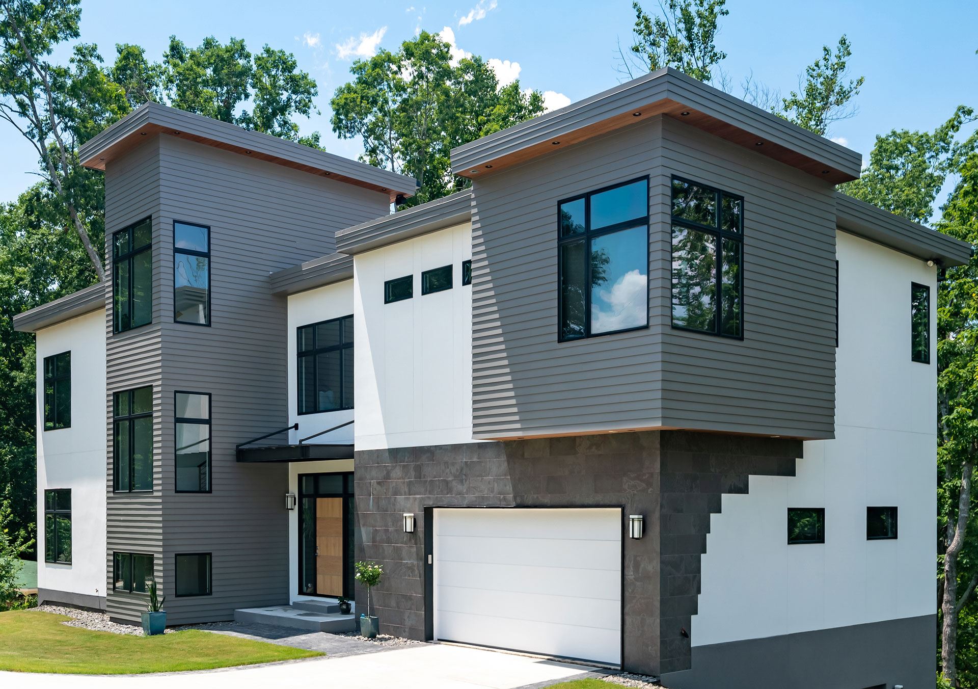 Exterior view of a building featuring Nichiha fiber cement panels and modern design