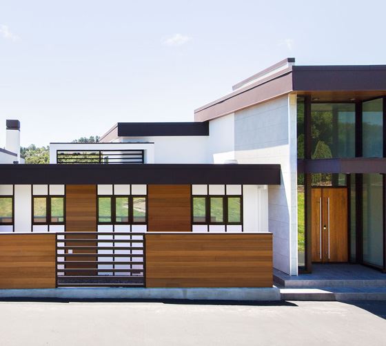 Exterior view of a building featuring Nichiha fiber cement panels and modern design