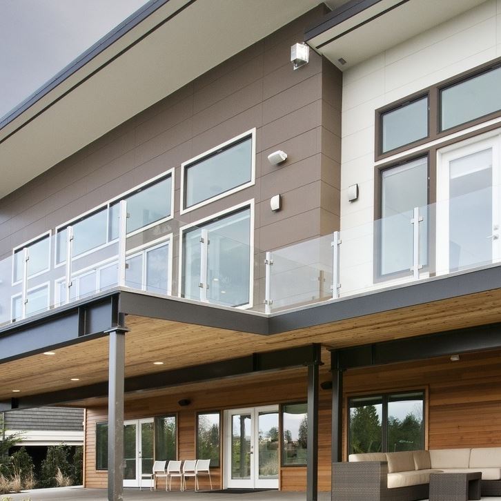 Exterior view of a building featuring Nichiha fiber cement panels and modern design