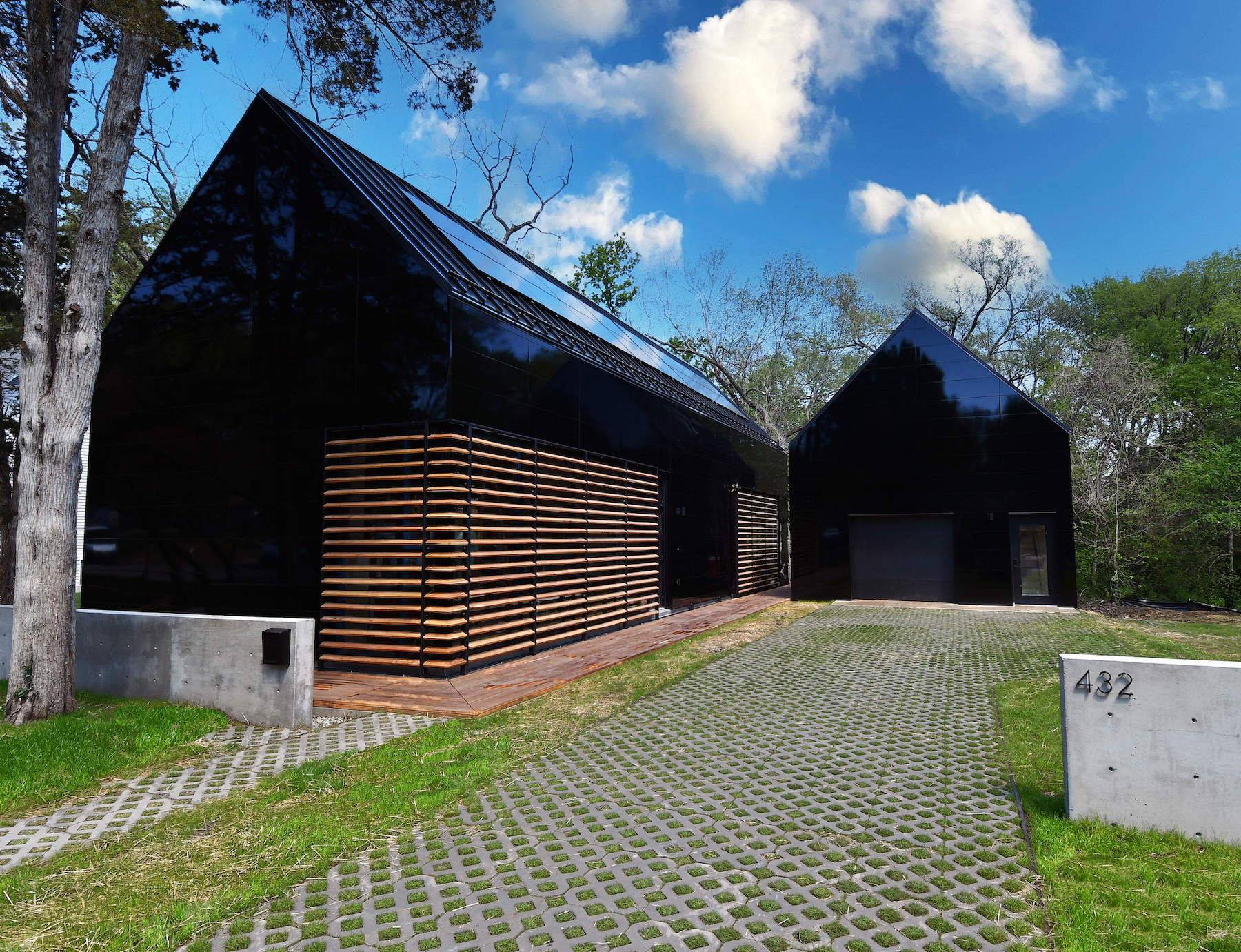 Exterior view of a building featuring Nichiha fiber cement panels and modern design