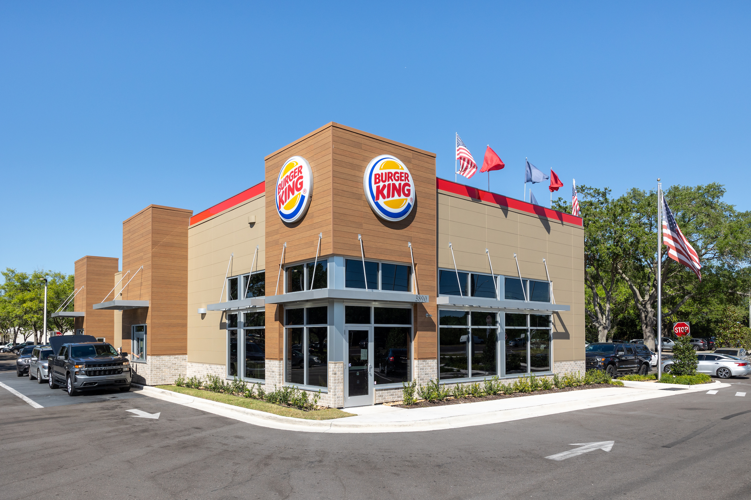 Exterior of fast food restaurant with fiber cement panels and signage