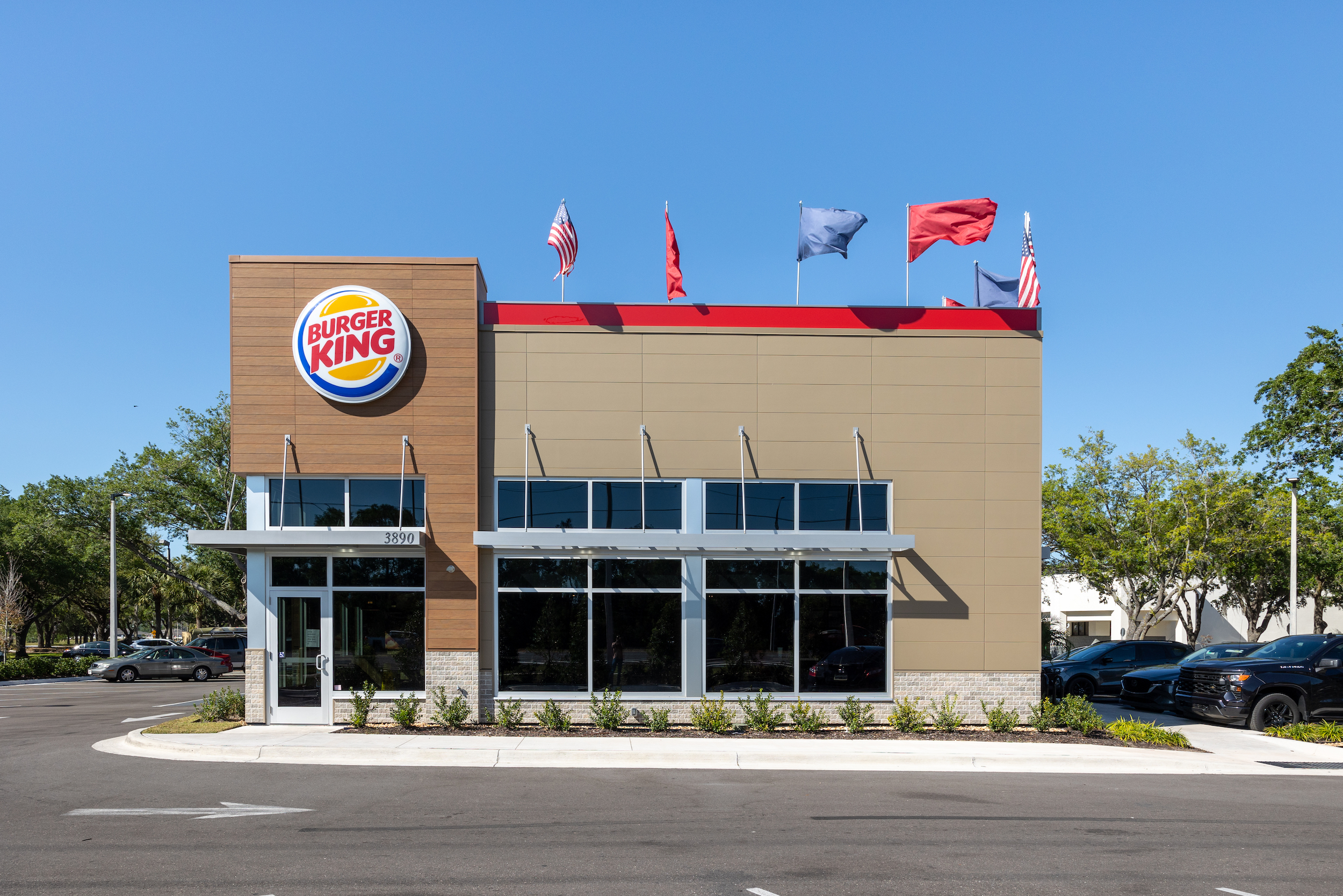Exterior of fast food restaurant with fiber cement panels and signage