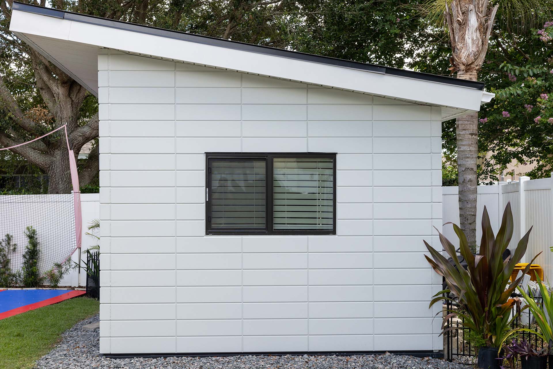 Side view of Arenth home studio in their backyard