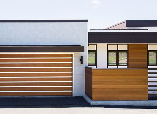 Exterior view of a building featuring Nichiha fiber cement panels and modern design