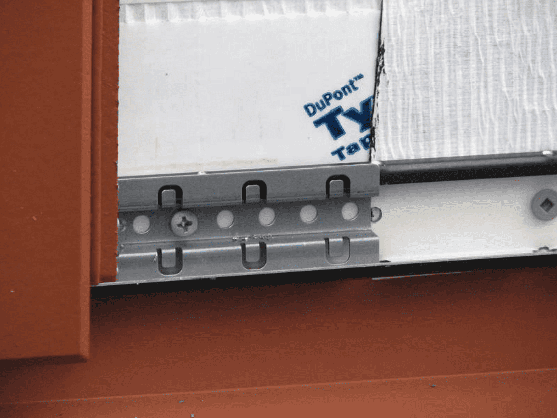 Exterior view of a building featuring Nichiha fiber cement panels and modern design