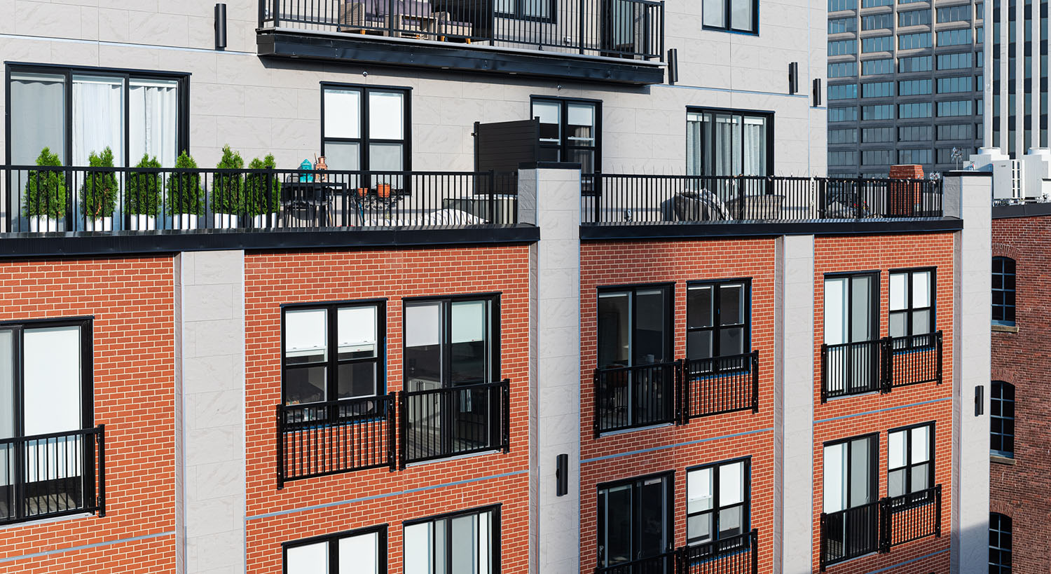 Exterior of Telegraph Square in Canada featuring large expanse of Nichiha's PlymouthBrick