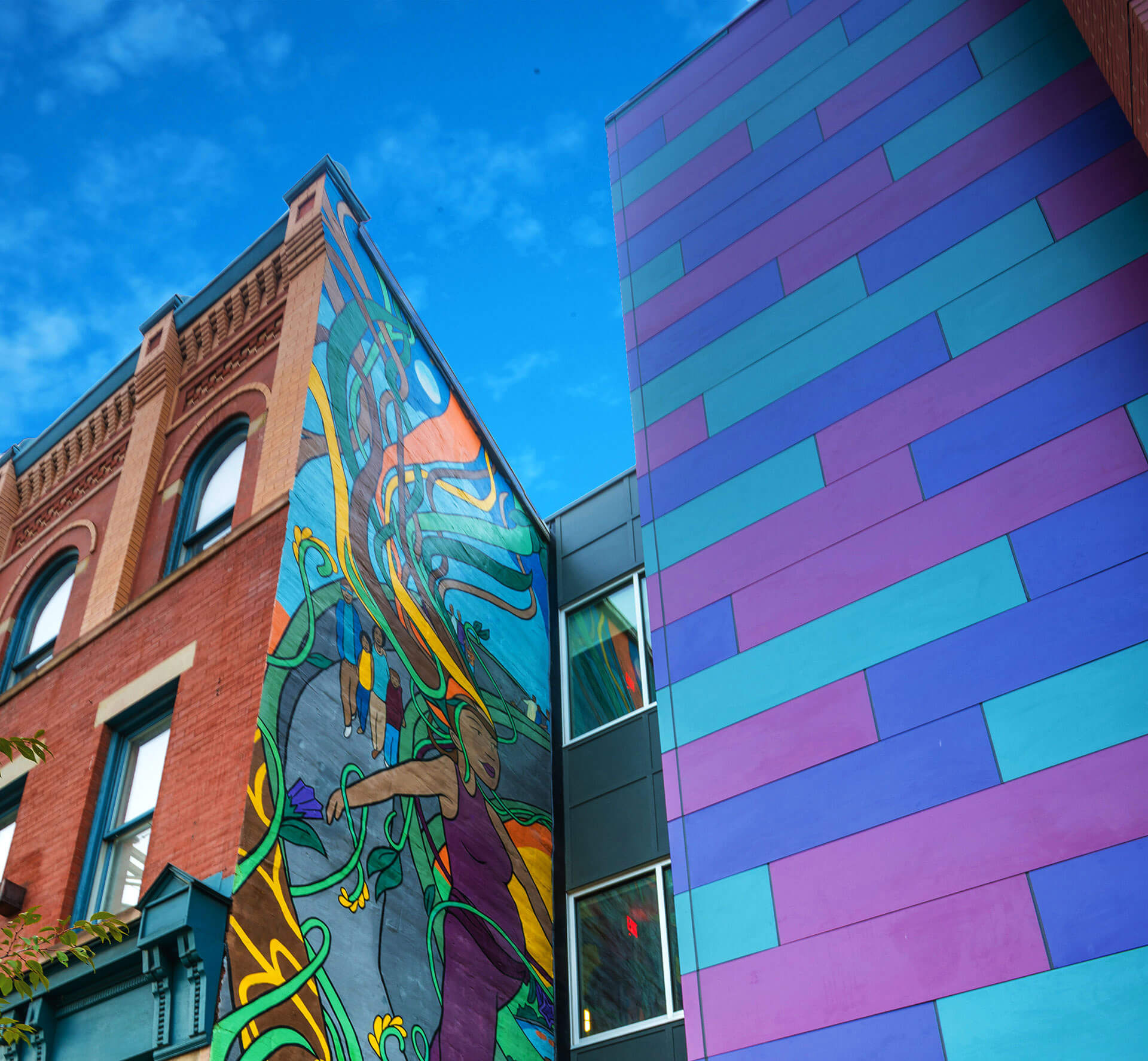 Exterior view of a building featuring Nichiha fiber cement panels and modern design