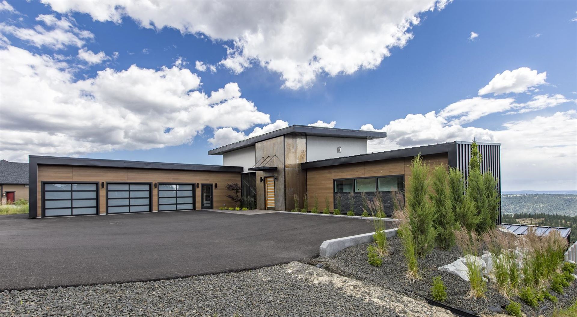 Exterior view of a building featuring Nichiha fiber cement panels and modern design