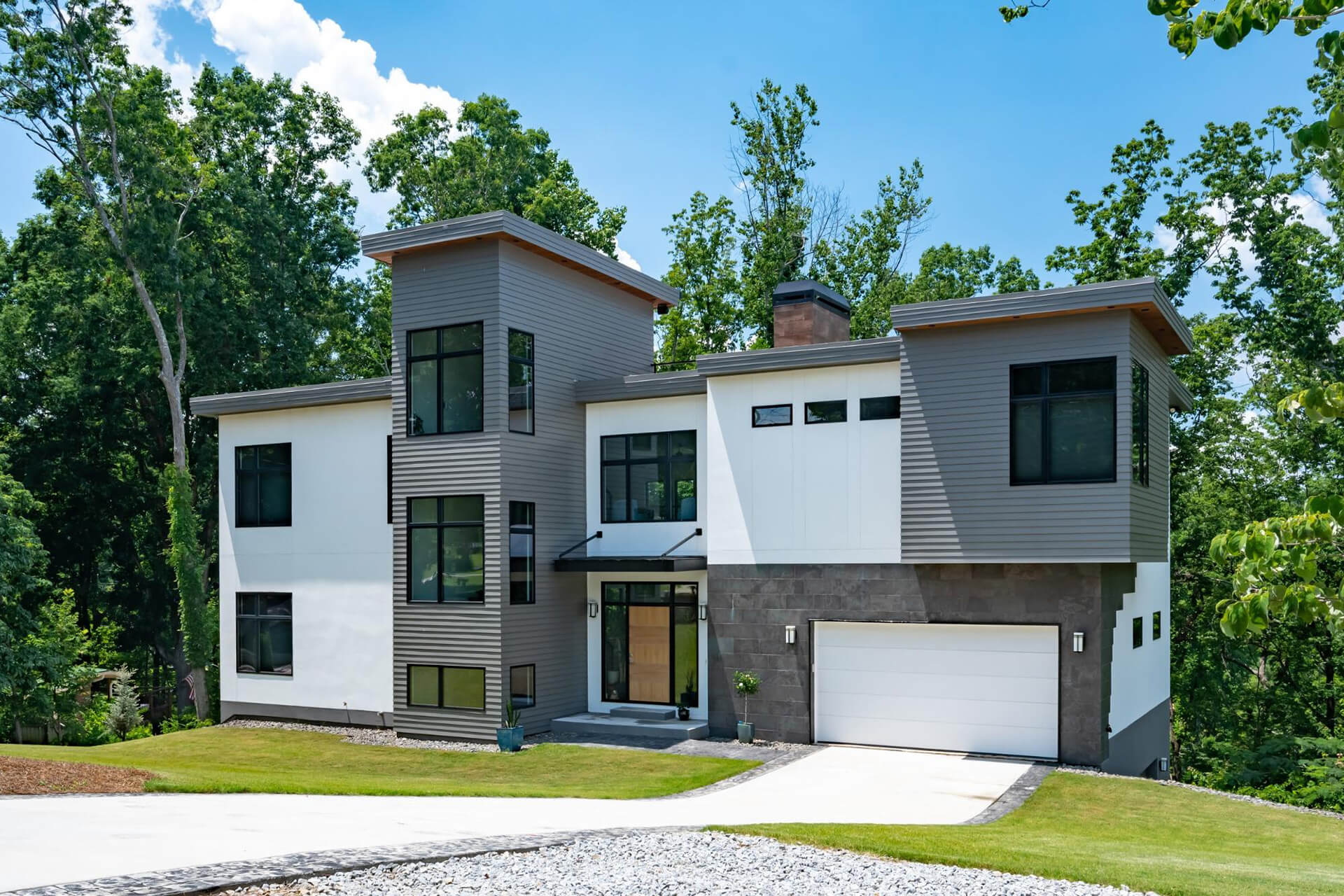 Exterior view of a building featuring Nichiha fiber cement panels and modern design