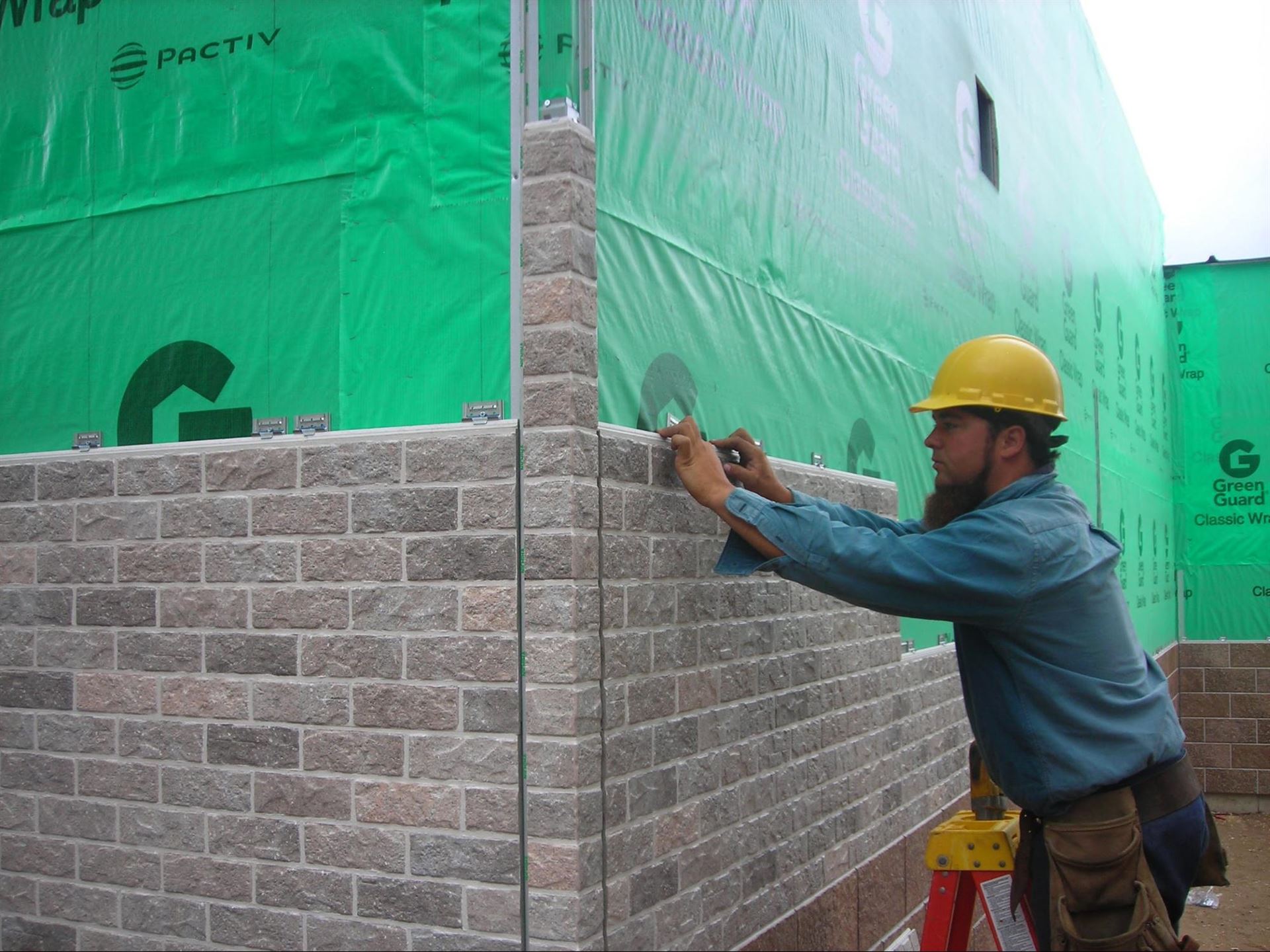 Exterior view of a building featuring Nichiha fiber cement panels and modern design