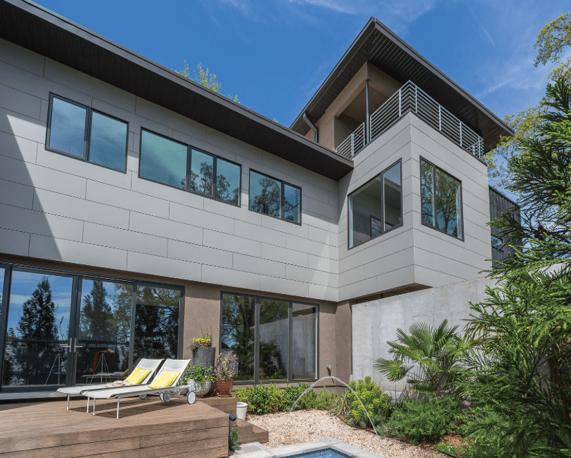 Exterior view of a building featuring Nichiha fiber cement panels and modern design