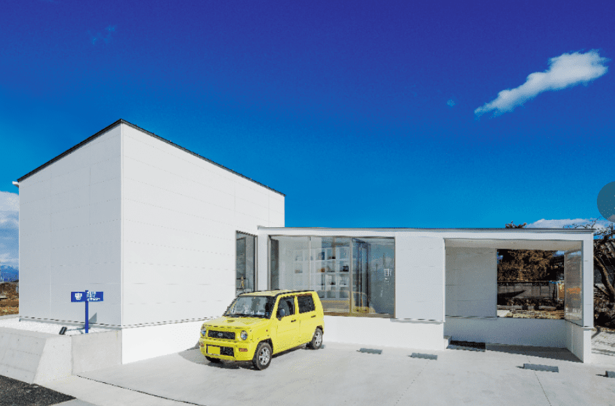 Exterior view of a building featuring Nichiha fiber cement panels and modern design
